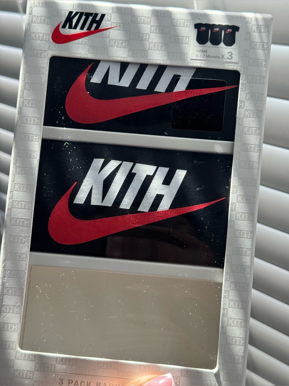 Kith x Nike Onesies